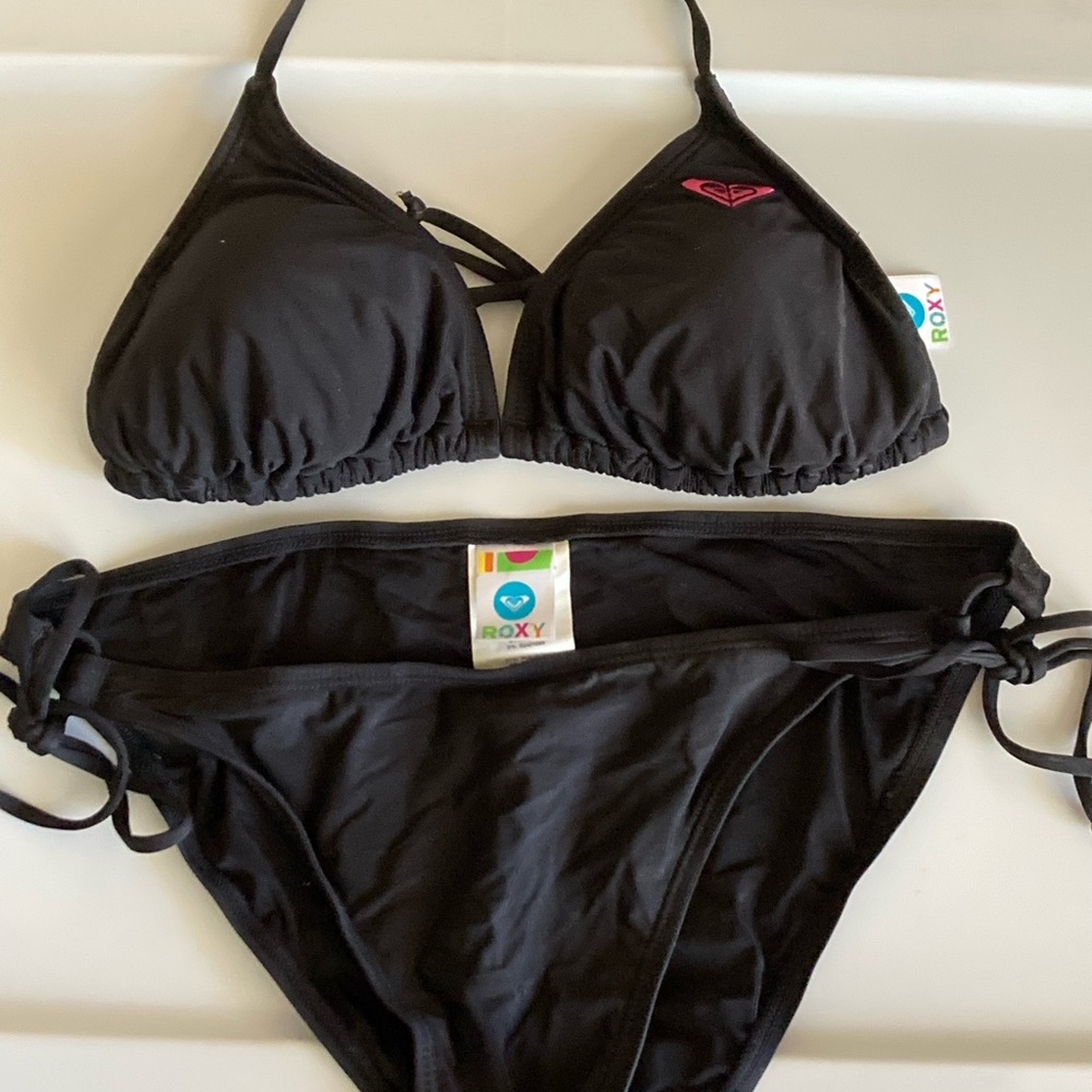 Roxy black string bikini size Large with pink logo.
